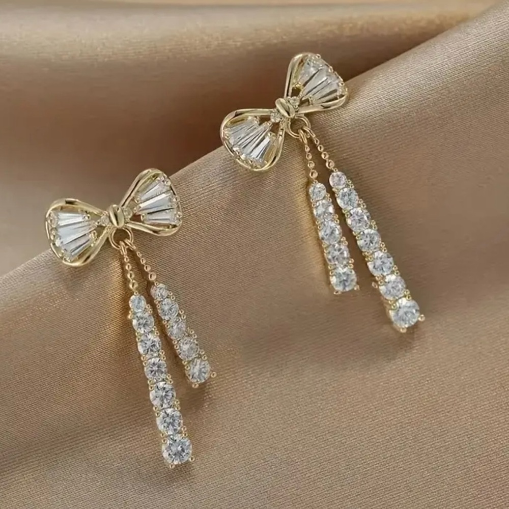 NWOT - Elegant Gold and Silver Crystal Bow Earrings